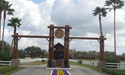 GLAMPING at its finest. Water front, shaded, private dock, river and lake access
