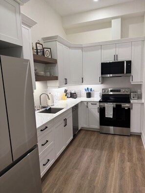 Fridge, microwave, oven, stovetop - 
Brand New! Downtown Stratford - The Blowes Inn 2C: 2 Bedrooms! (Stratford)