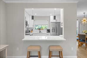 Fridge, microwave, oven, stovetop - A Freshly Reimagined Island Retreat on West Gulf Drive (Sanibel)