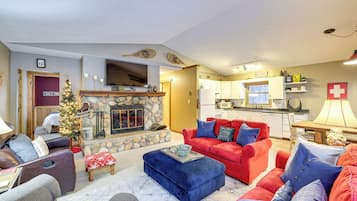 TV, fireplace, books, stereo