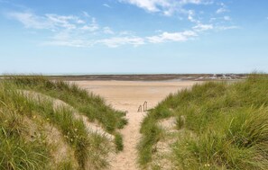 A sandy beach with a clear sky and dunes. - Awesome home in CREANCES with WiFi (CREANCES)