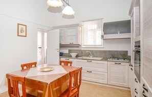 Fridge, stovetop, coffee/tea maker, cookware/dishes/utensils
