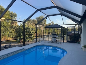 Outdoor pool, a heated pool - JUST REMODELED BEAUTIFUL POOL HOME! ONLY 3 MILES from Ft Myers Beach/Sanibel. (Fort Myers)