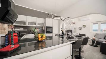 Villa | Private kitchen | Fridge, oven, stovetop, dishwasher