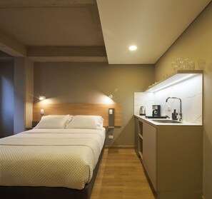 Appartamento Comfort, vista città | Ferro/asse da stiro, Wi-Fi gratuito