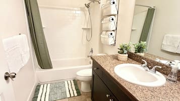 Hair dryer, towels, soap, toilet paper