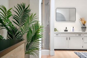 Shower, hair dryer, towels