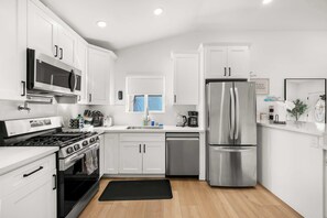 Fridge, microwave, oven, stovetop - @ Marbella Lane - Cityside Haven w/ Touch of Charm (Compton)