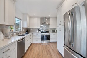 Fridge, microwave, oven, stovetop - Marbella Lane - 3BR Designer Home in Pacifica (Pacifica)