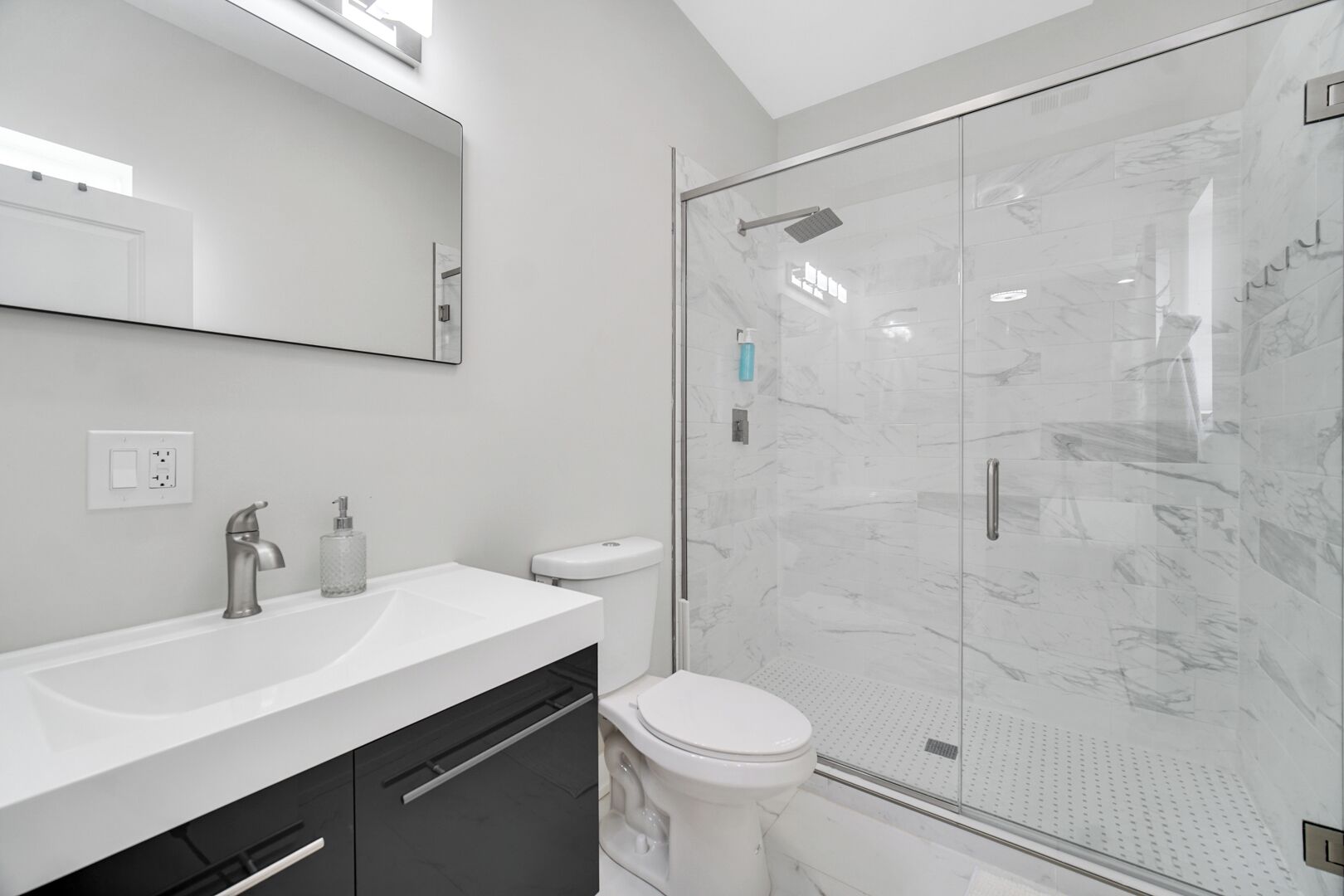 Hair dryer, towels, soap, toilet paper