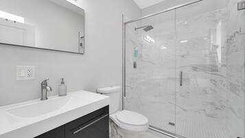 Hair dryer, towels, soap, toilet paper