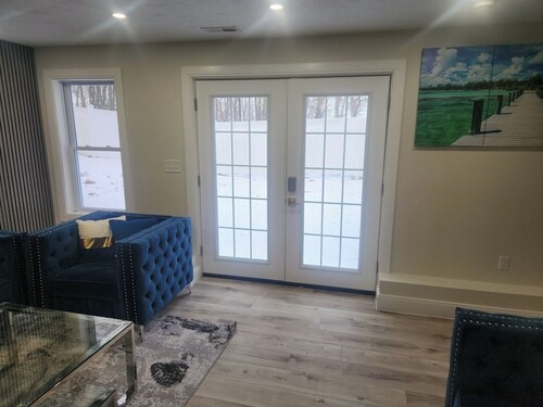 Modern Basement Suite • King Bed and 100” TV