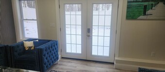 Modern Basement Suite • King Bed and 100” TV