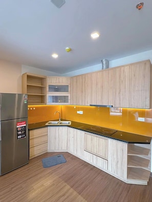 Business Apartment, 2 Bedrooms, Balcony, Ocean View | Private kitchen | Fridge, stovetop, cookware/dishes/utensils - FLC Sea Tower Quy nhon official  (Quy Nhơn)