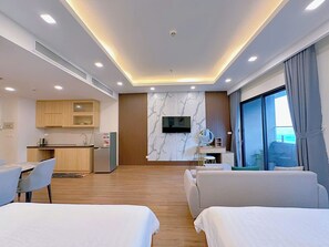 Business Studio, 2 Queen Beds, Balcony, Beach View | Desk, laptop workspace, blackout drapes, iron/ironing board - FLC Sea Tower Quy nhon official  (Quy Nhơn)