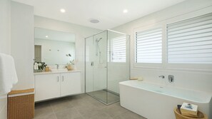 Shower, hair dryer, towels