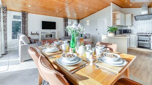 A modern kitchen with white cabinets, a microwave, and a stove. - Field View 2 bed-No pets-Hornbeam - sleeps 6 guests  in 2 bedrooms (Eye)