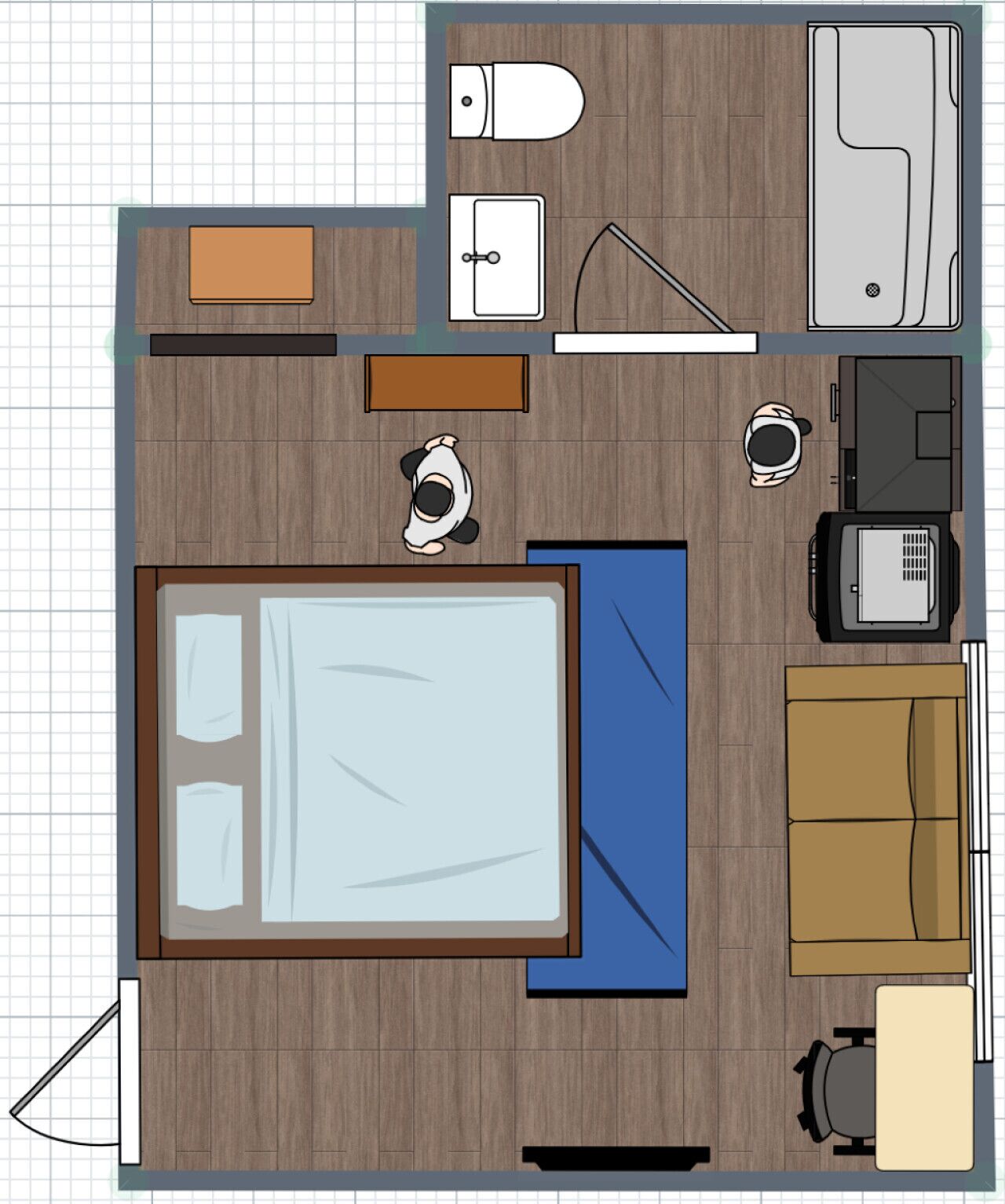 A bedroom with a bed, bedside tables, a wardrobe, and a desk with a chair.