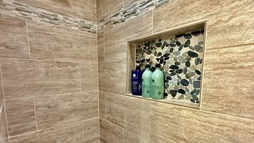 Shower, hair dryer, towels, toilet paper