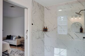 Shower, hair dryer, towels, soap