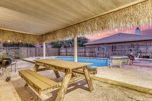Outdoor dining - Tiger Point Tiki=-New Listing Gulf Breeze, 4-bedroom home with a Pool, Game Room! (Gulf Breeze)