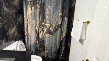 Hair dryer, towels, soap, toilet paper