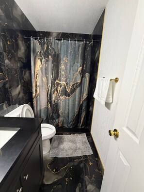 Hair dryer, towels, soap, toilet paper