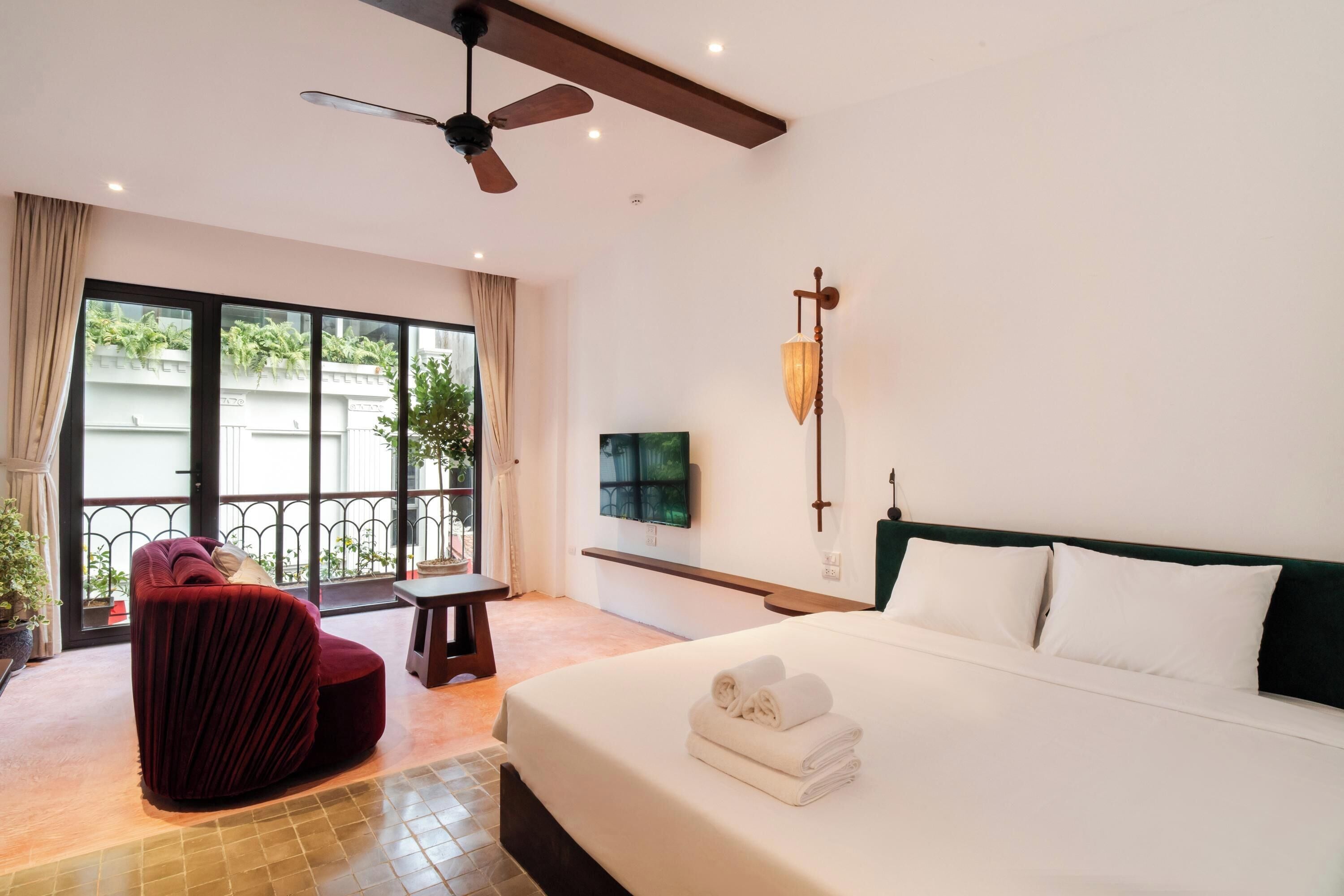 Deluxe Double Room, Balcony, City View | In-room safe, desk, laptop workspace, blackout drapes