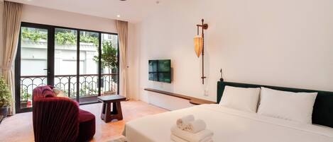 Deluxe Double Room, Balcony, City View | In-room safe, desk, laptop workspace, blackout drapes