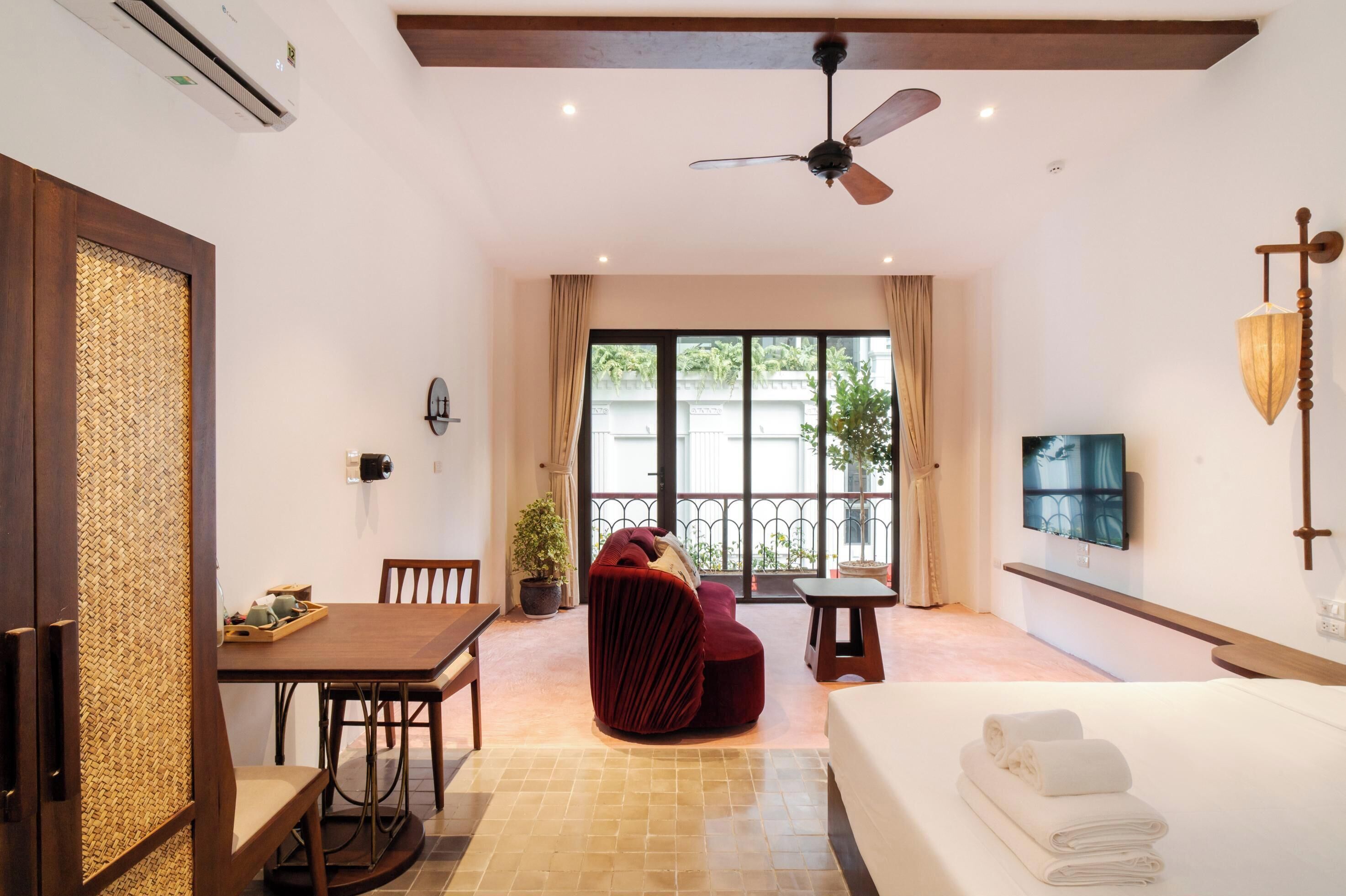 Deluxe Double Room, Balcony, City View | In-room safe, desk, laptop workspace, blackout drapes