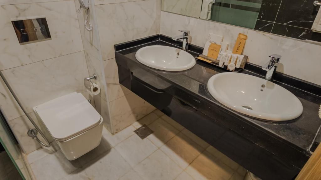 Hair dryer, towels, soap, shampoo