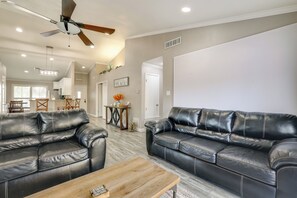 TV, fireplace, books