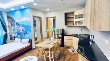 Comfort Apartment, 2 Bedrooms, Balcony, Beach View | Living area | 45-inch flat-screen TV with cable channels