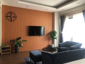 Business Studio, Balcony, Beach View | Living area | 45-inch flat-screen TV with cable channels - FLC Quy Nhon - Sea View - AN NHIEN (Quy Nhơn)