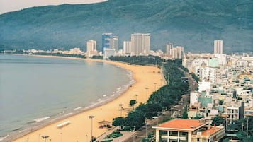 Plage, sable blanc, cabines gratuites, navette pour la plage