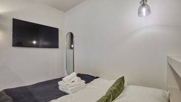 Apartamento | 1 quarto, ferros/tábuas de passar roupa, roupa de cama