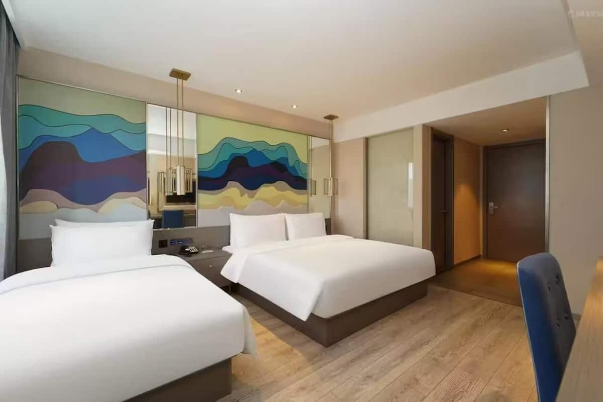 Premium bedding, down duvets, in-room safe, desk