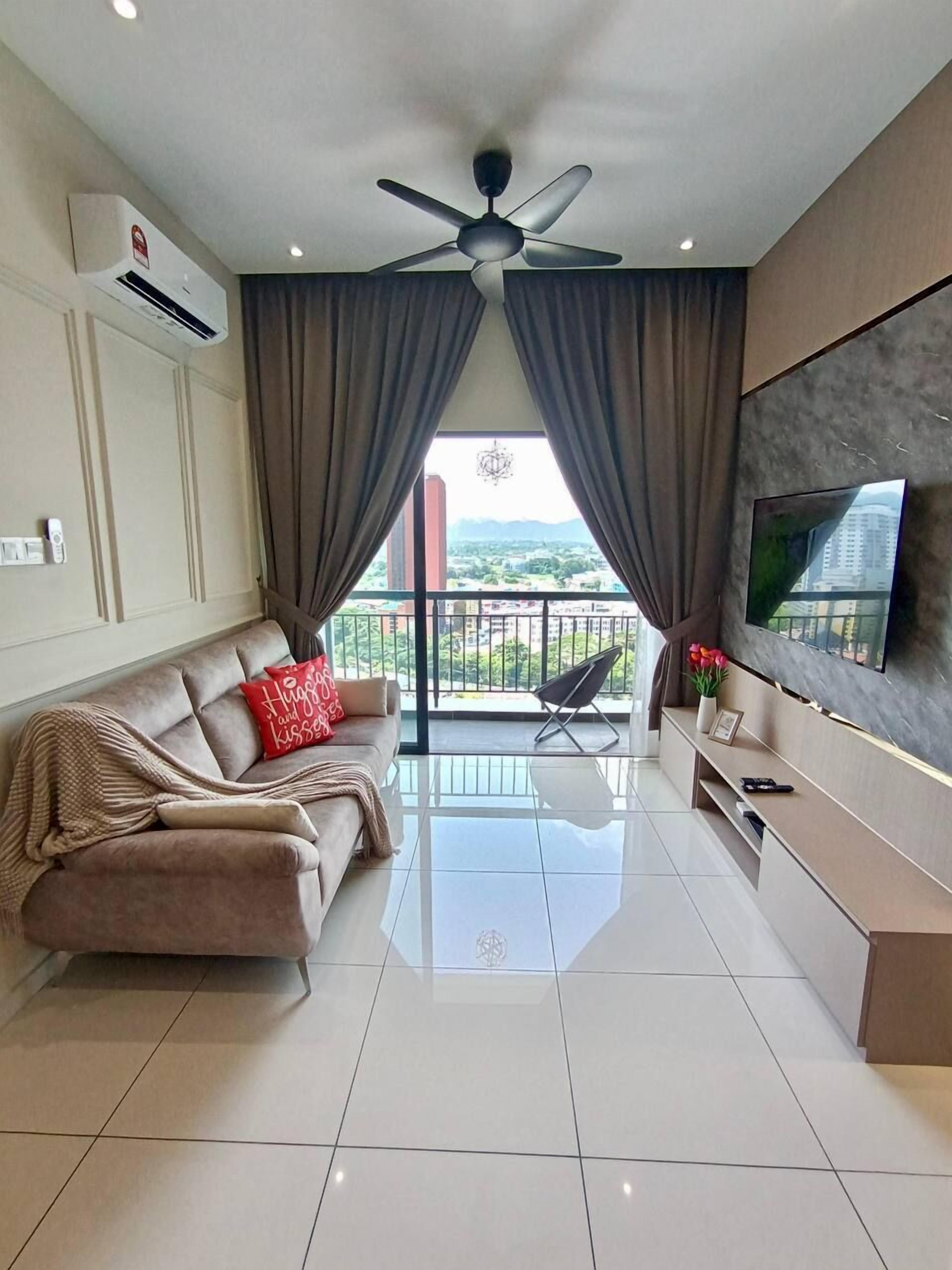 Executive Apartment | Living area | 42-inch LCD TV with digital channels