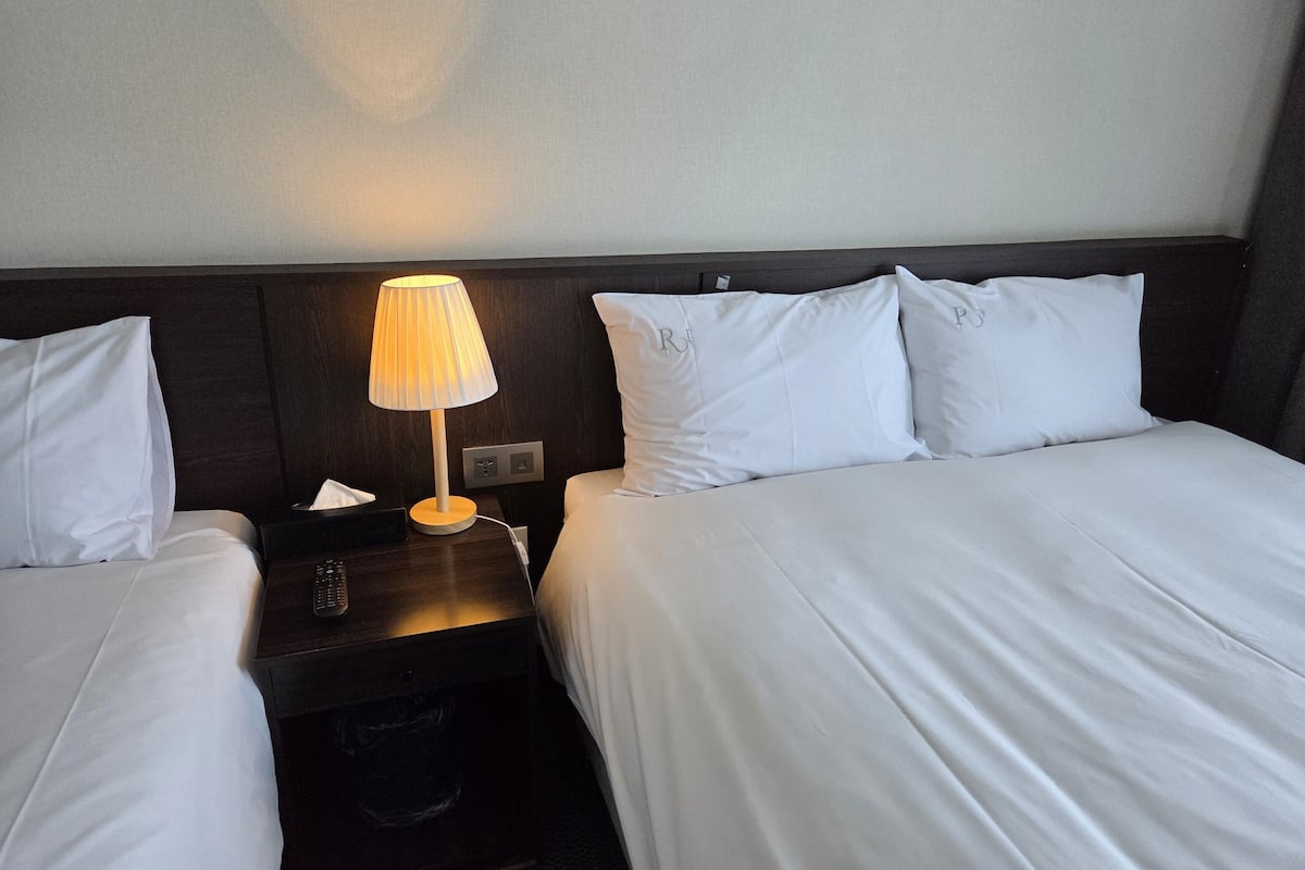 Family Room, Balcony, City View | Free WiFi