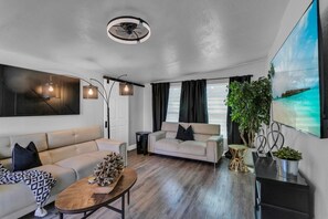 TV, fireplace - Backyard Zen  Retreat with Modern Vibe (Tampa)