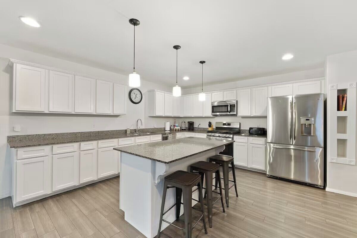 Habitación cuádruple Confort, vista al jardín | Cocina privada | Refrigerador, microondas, horno y parrilla de estufa 