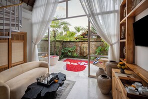 Villa, 1 habitación, vistas al jardín | Zona de estar