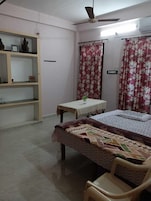 Deluxe Apartment, Air conditioning | Desk, laptop workspace, rollaway beds, bed sheets