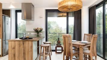 Junior Suite, Park View, Corner | Living area | Flat-screen TV