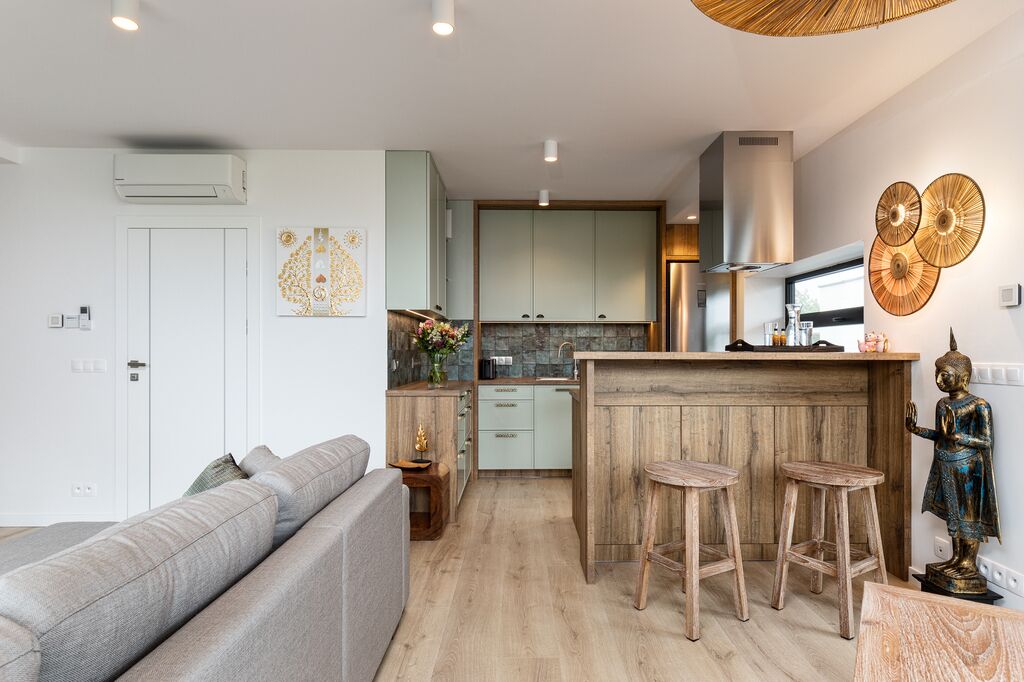 Deluxe Suite, 2 Bedrooms, Hill View | Living area | Flat-screen TV