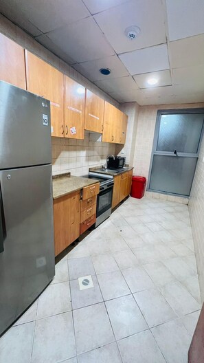 Economy Room, Balcony, City View | Shared kitchen | Fridge, microwave, oven, stovetop - Nicest Partition Room in Tecom  (Dubai)