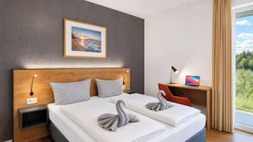 Desk, travel cot, free WiFi, bed sheets