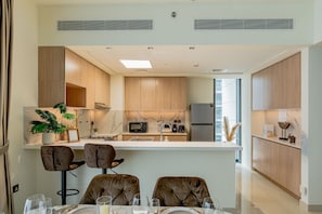 Luxury Apartment, Balcony, City View | Private kitchen | Coffee/tea maker, electric kettle, toaster - Sophisticated Interior near Hayat Beach (Ras Al Khaimah)