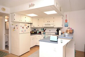 Fridge, microwave, oven, stovetop - Oceanblock Condo. A few steps from the beach (Ocean City)