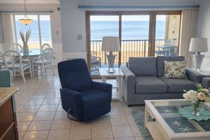 Living area - Beautiful and comfortable 2 bedroom oceanfront condo with free WiFi and beautiful ocean view located midtown just steps to the beach! (Ocean City)